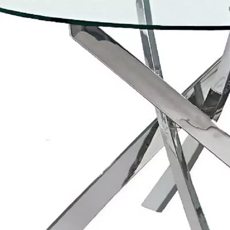 Table de salle à manger avec plateau rond, piétement croisé en métal et verre transparent et argenté - 54