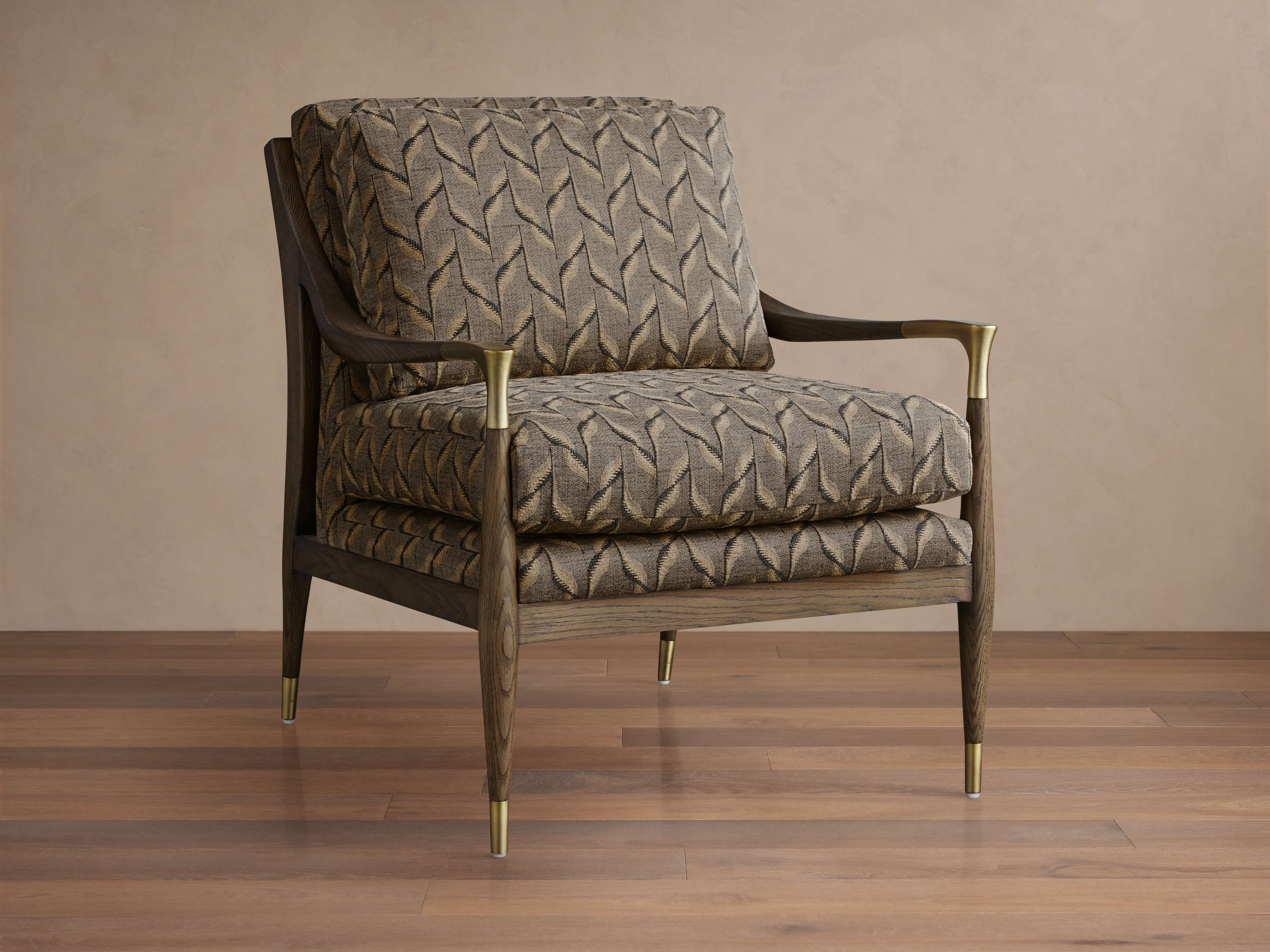 Fauteuil rembourré avec coussins en mélange de plumes et de duvet