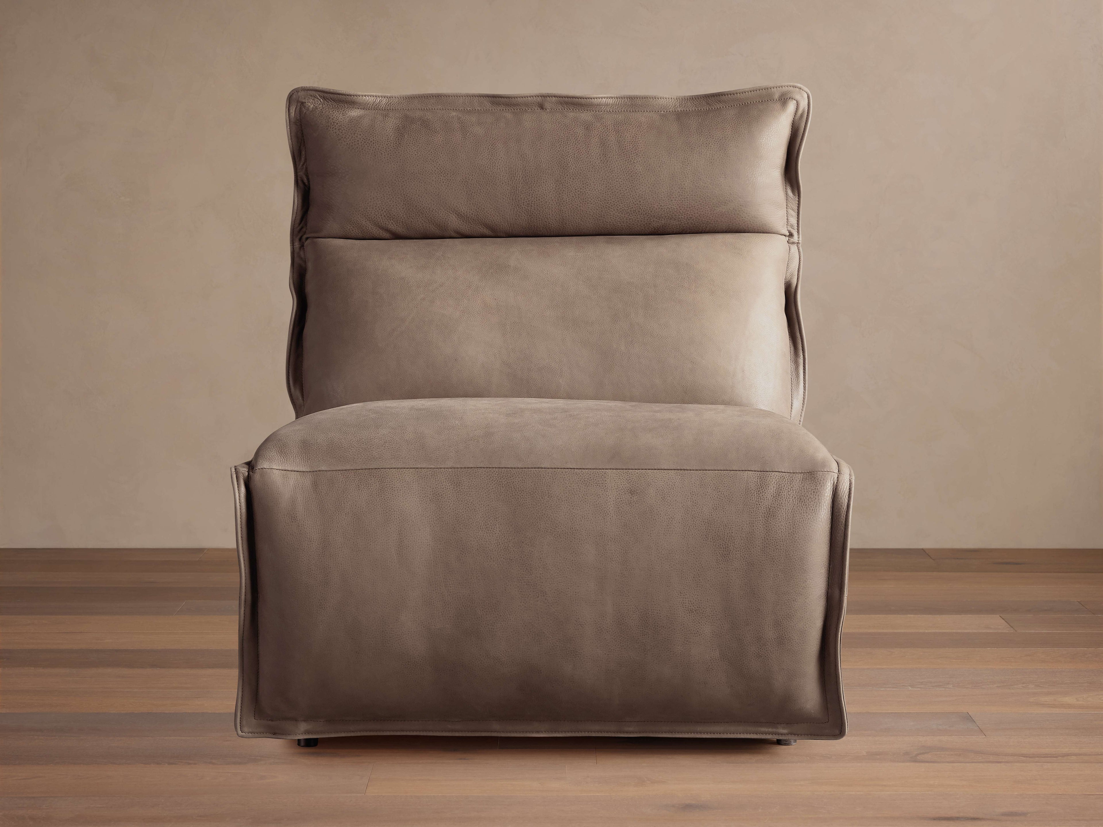 Fauteuil inclinable électrique en cuir sans accoudoirs avec dossier haut et coussin en mélange de duvet