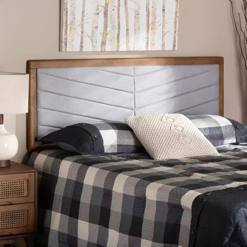Tête de lit en bois tapissée de tissu